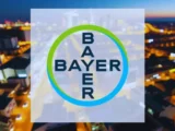 Bayer Logo mit Pharmaceuticals und Crop Science Symbolen