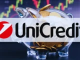 Illustration zweier Bankgebäude von UniCredit und Commerzbank mit Verbindungslinien als Symbol für geplante Übernahme und europäische Bankenfusion 2026