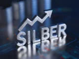 Silberbarren und Chart mit steigender Kursentwicklung nahe 80 US-Dollar Marke im Rohstoffmarkt