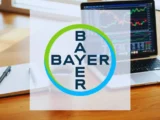 Bayer Aktie Kurschart mit Pharma-Logo