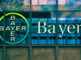 Bayer Aktie Kurs mit DAX-Hintergrund